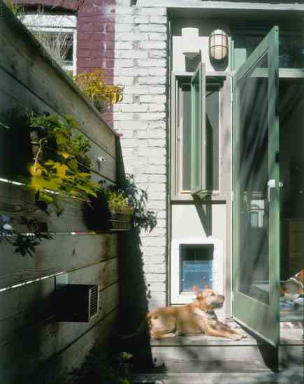 With planter boxes on the top and sides of the patio walls, Scott has more gardening space than many urban dwellers.